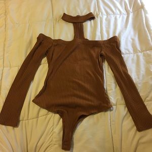 Light brown body suit with choker attachment